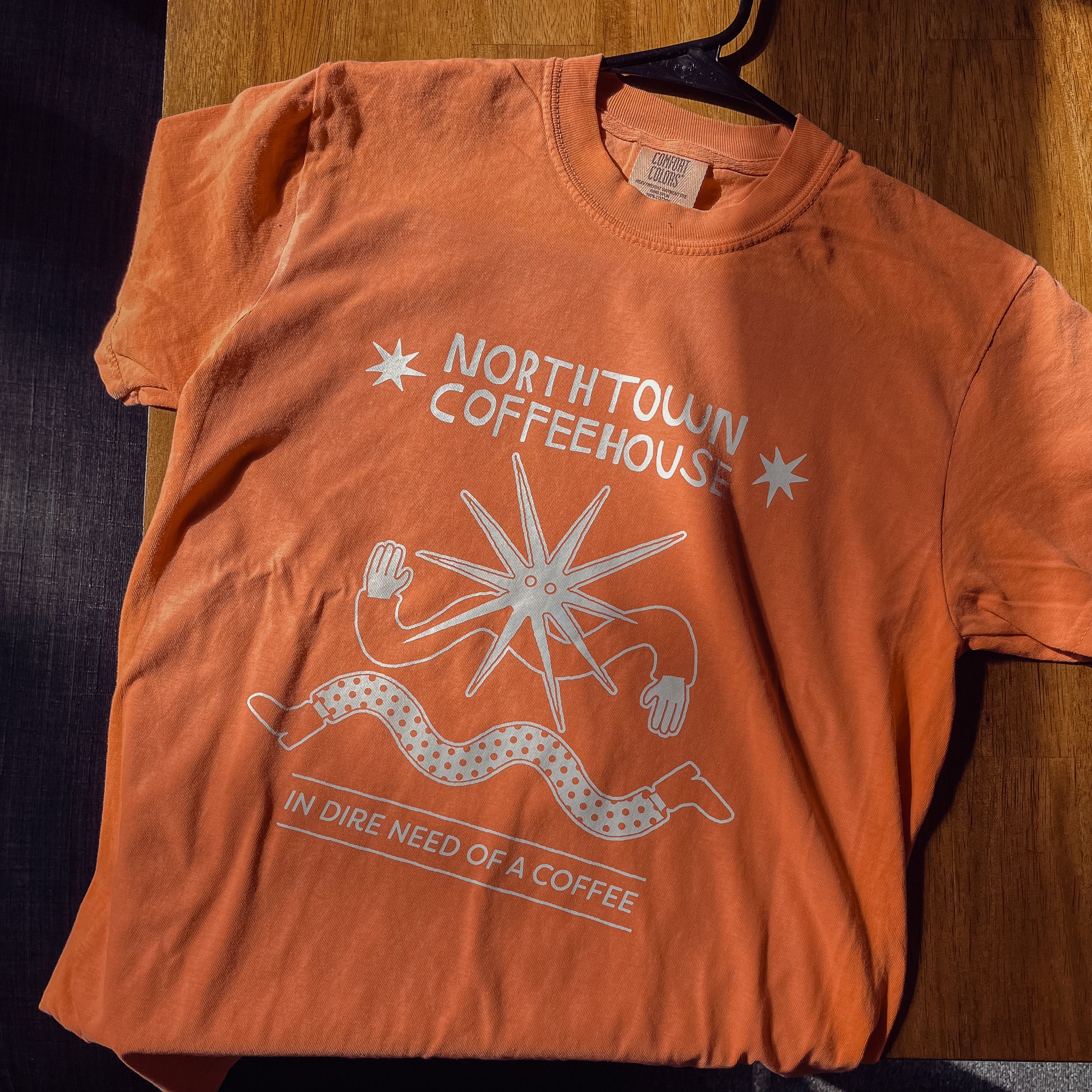 In Dire Need of - T-Shirt